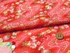 ちりめん生地・らせん流水に花と蝶(赤)