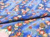 ちりめん生地・らせん流水に花と蝶（青）