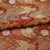 金襴生地(金らん) 花と伝統柄の金波模様(赤)