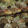 金襴生地(金らん) 雪輪尽くし花模様(黒)