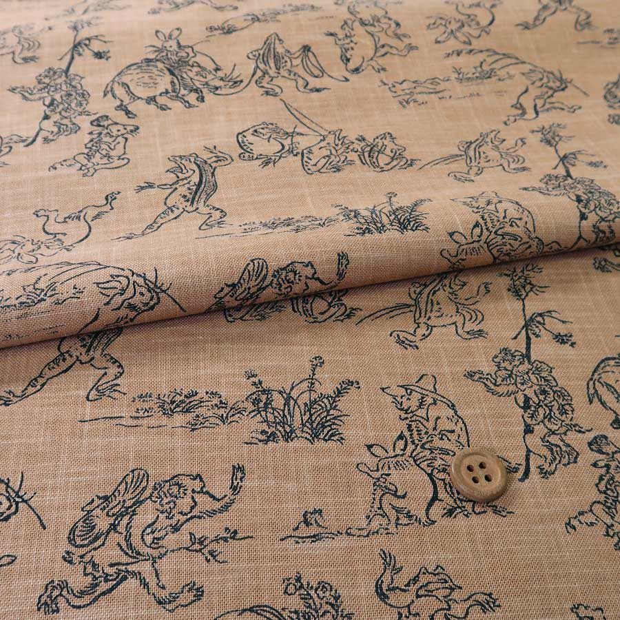 和柄コットン生地・鳥獣人物戯画(こげ茶) 10cm単位 切り売り |生地 和