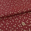 和柄コットン生地 金の小桜(えんじ色)