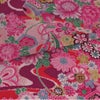 一越ちりめん生地 しぼりに花のし小槌文様(ピンク/あずき) 10cm単位 切り売り