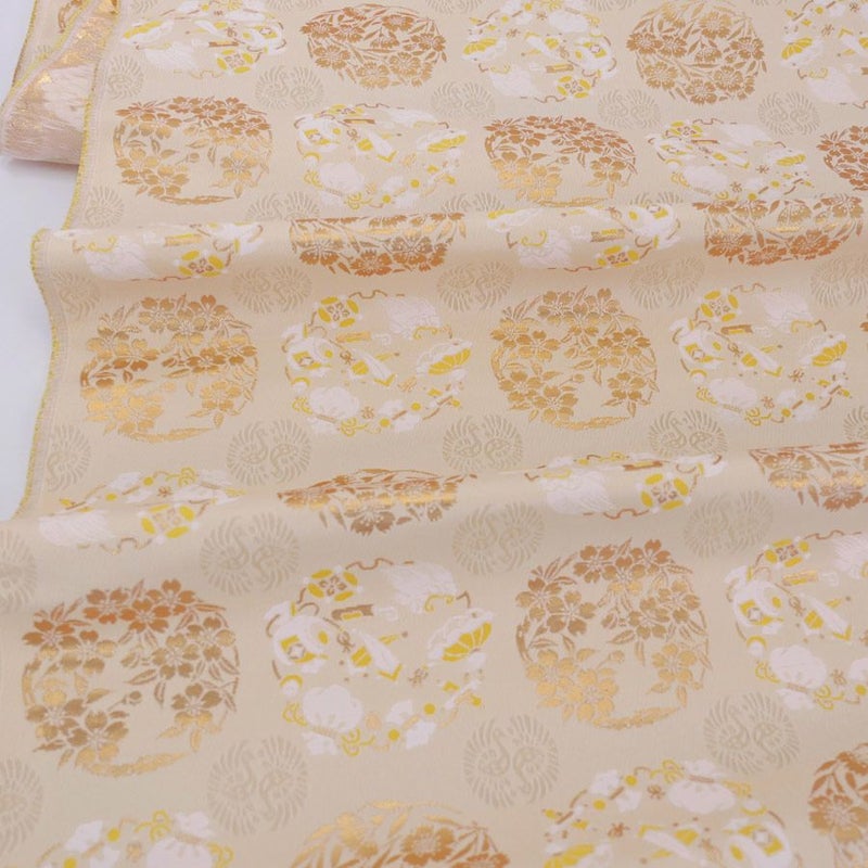 金襴生地(金らん) 花丸と宝尽くし(クリームベージュ)