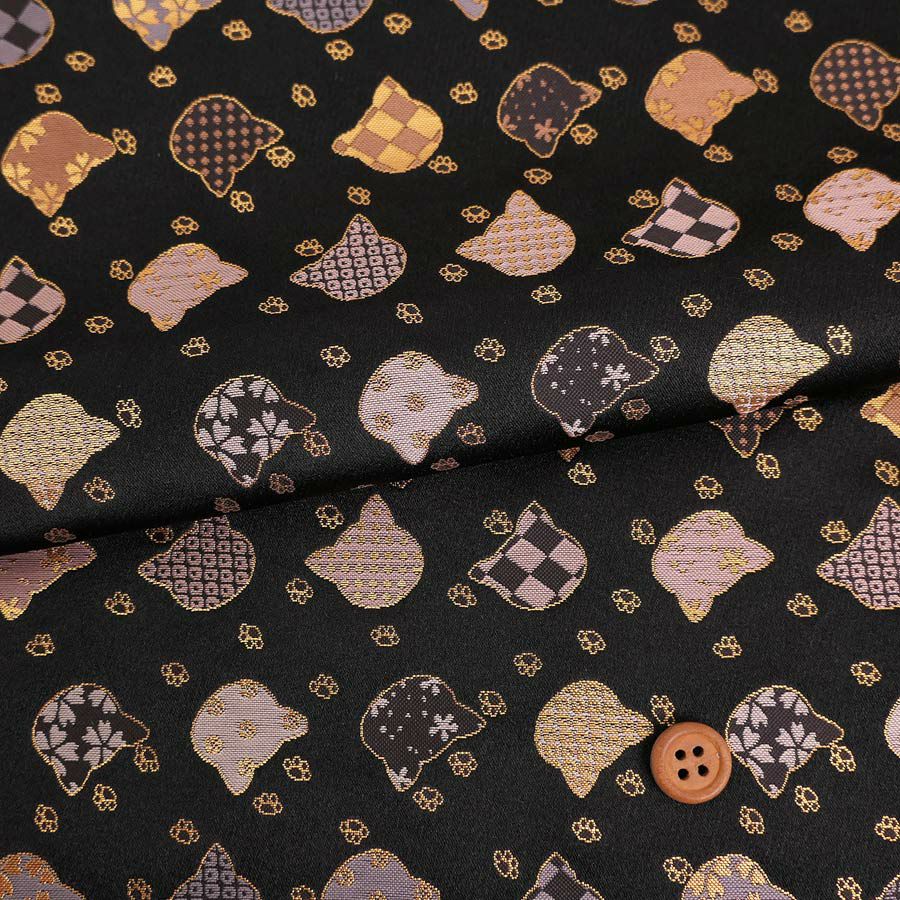 金襴生地(金らん) ねこ型に伝統柄(黒) 10cm単位 切り売り |生地 和柄