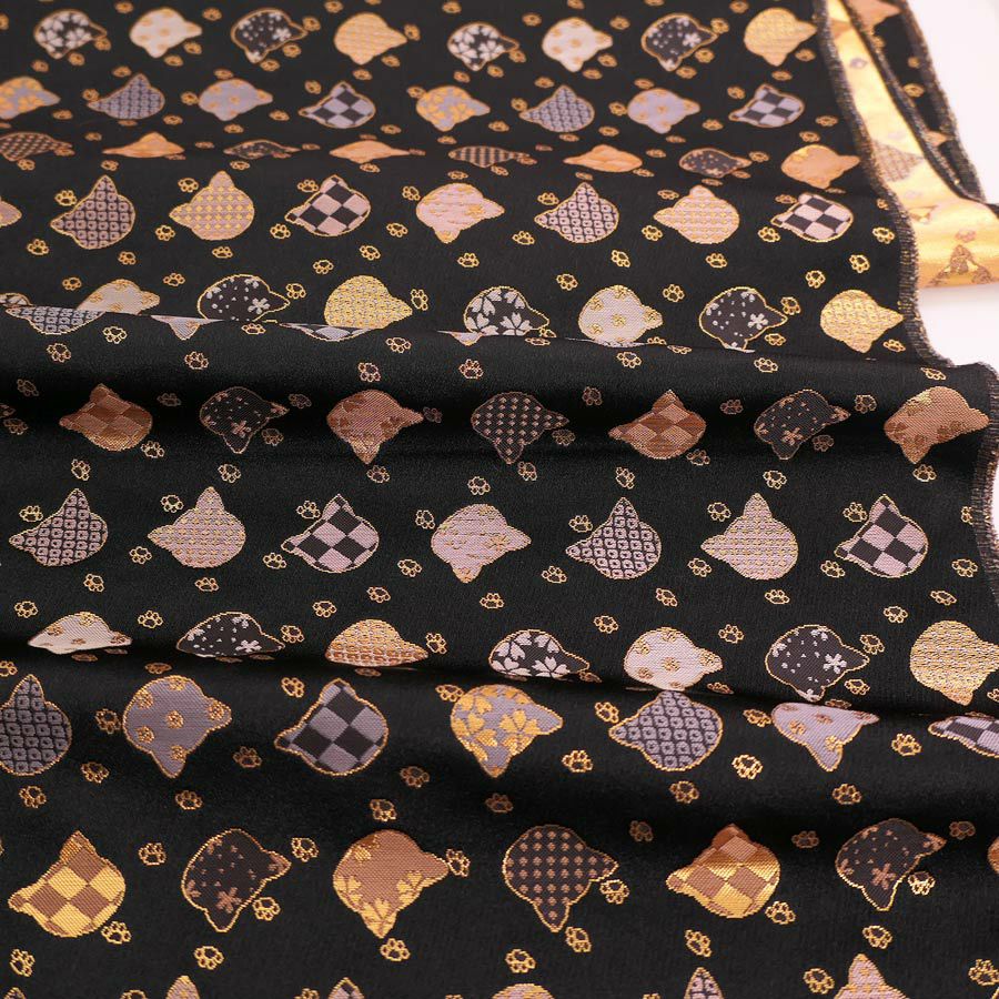 金襴生地(金らん) ねこ型に伝統柄(黒) 10cm単位 切り売り |生地 和柄