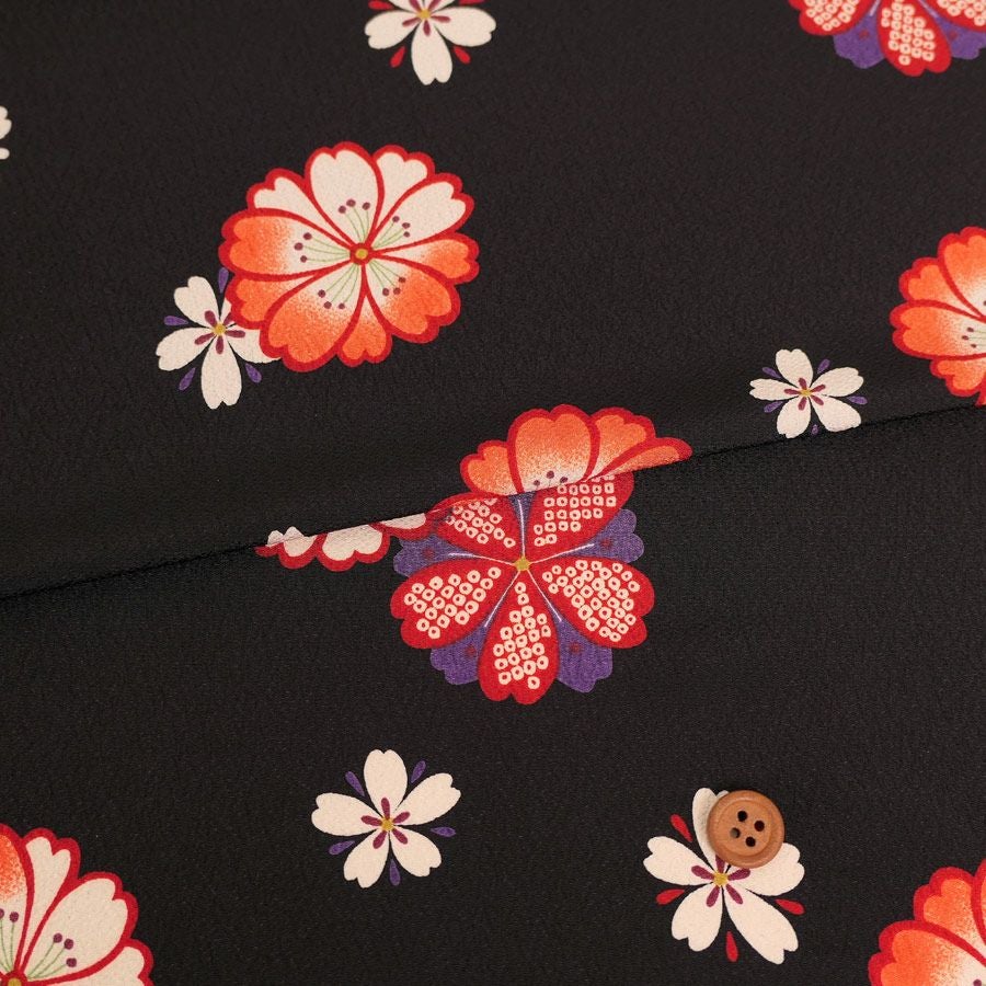 ポリちりめん生地 桜紋ちらし(黒/オレンジ) 10cm単位 切り売り |生地