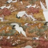 和柄コットン生地 海に遊ぶ鶴(ブラウン) 10cm単位 切り売り モダン和風柄 鶴柄 波柄木綿生地 男性シャツ生地 茶色 nora