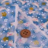 ちりめん生地・うさぎと桜(水色) 10cm単位 切り売り レーヨンちりめん生地 ウサギ柄縮緬 兎兔さくら 可愛いチリメン