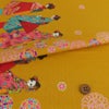 和風コットン生地・舞妓さんのおでかけ(からし色) 10cm単位 切り売り