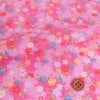 ちりめん生地 ぼかし地に芝と小花(ピンク)