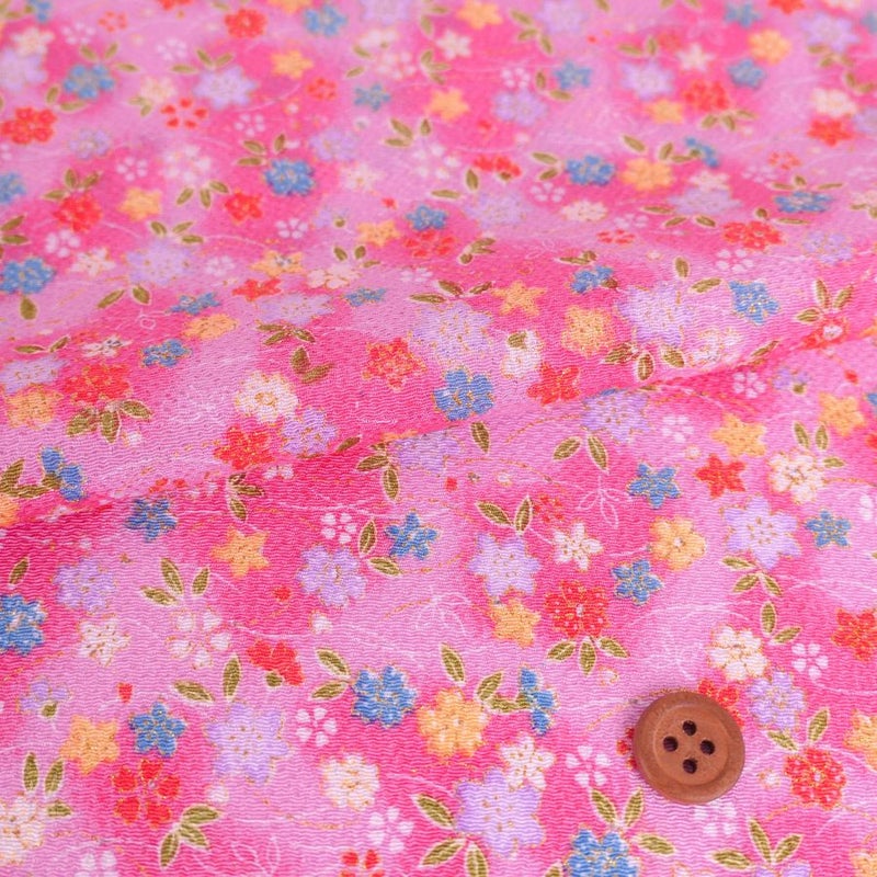 ちりめん生地 ぼかし地に芝と小花(ピンク)