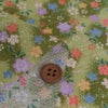 ちりめん生地 ぼかし地に芝と小花(黄緑)