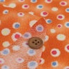 ちりめん生地 ドットのイルミネーション(オレンジ)