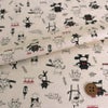 コットン生地 ねこのレストラン(アイボリー) 10cm単位