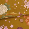 和柄コットン生地 花綴り(おうど色) 10cm単位 切り売り
