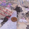 和柄コットン生地 野辺の花にうさぎ(ベージュ) 10cm単位 切り売り