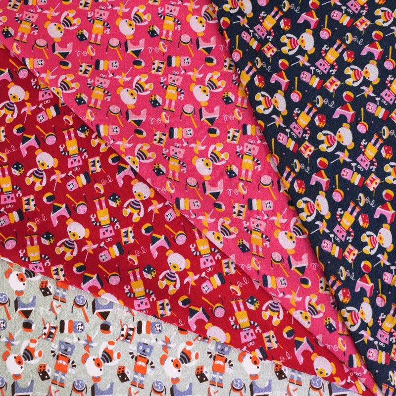 ちりめん生地 おもちゃのパレード(紺) 10cm単位 切り売り