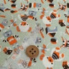 ちりめん生地 おもちゃのパレード(うす青磁) 10cm単位 切り売り
