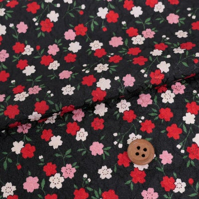 ポリジャガードちりめん生地 可憐な小桜(黒)10cm単位 切り売り |生地 