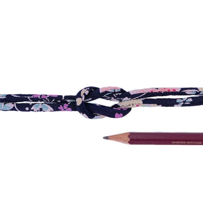 ちりめん丸ひも・柄・4ミリ(実寸約4-6ミリ) 桜祭・紺 10cm単位 切り売り 和装髪飾りひも 和柄コード 和の紐 チリメン生地のヒモ 桜柄紺色