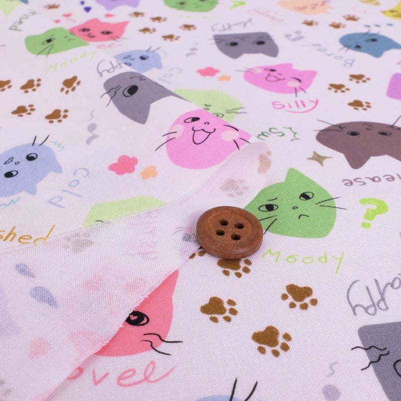 コットン生地 カラフル猫面相(白) 10cm単位 切り売り ネコ柄生地 猫柄木綿生地 ねこ柄布地 かわいい ポップな柄 nora