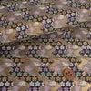 金襴生地(金らん) 花しぐれ流水文様(黒) 10cm単位 切り売り 西陣織きんらん化繊 和風生地伝統柄 和調花柄 雑貨衣装向き 黒金