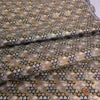 金襴生地(金らん) 花しぐれ流水文様(黒) 10cm単位 切り売り 西陣織きんらん化繊 和風生地伝統柄 和調花柄 雑貨衣装向き 黒金