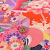 一越ちりめん生地 花孔雀(オレンジ) 10cm単位 切り売り