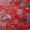 金箔一越ちりめん 折鶴と和花(赤) 10cm単位 切り売り