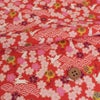 和柄コットン生地 うさぎと桜の吉祥文様(赤) 10cm単位 切り売り
