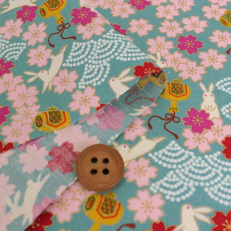 和柄コットン生地 うさぎと桜の吉祥文様(ブルー) 10cm単位 切り売り