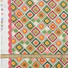 コットン生地 かぎ針編みのモチーフ柄(グリーンオレンジ) 10cm単位 切り売り