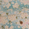 和柄コットン生地 春霞の桜(空色) 10cm単位 切り売り