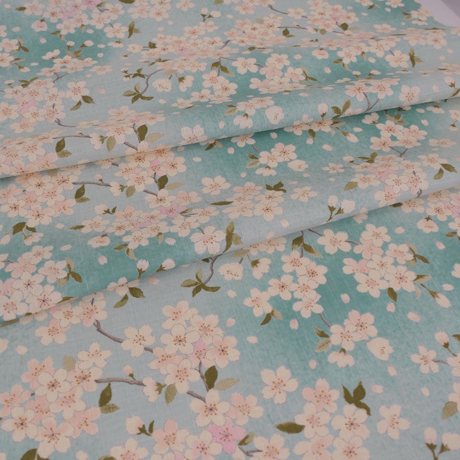 和柄コットン生地 春霞の桜(空色) 10cm単位 切り売り