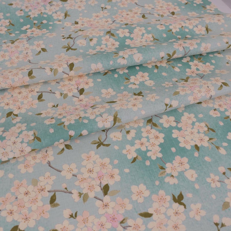 和柄コットン生地 春霞の桜(空色) 10cm単位 切り売り
