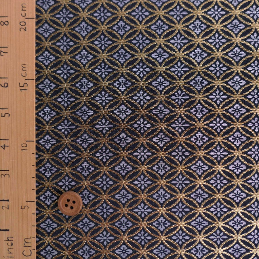 金襴生地(金らん) 花菱七宝つなぎ(黒) 10cm単位 切り売り