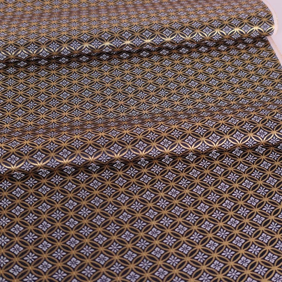 金襴生地(金らん) 花菱七宝つなぎ(黒) 10cm単位 切り売り