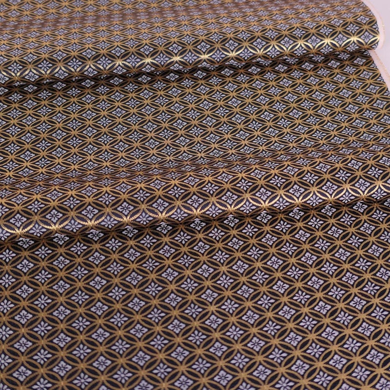 金襴生地(金らん) 花菱七宝つなぎ(黒) 10cm単位 切り売り