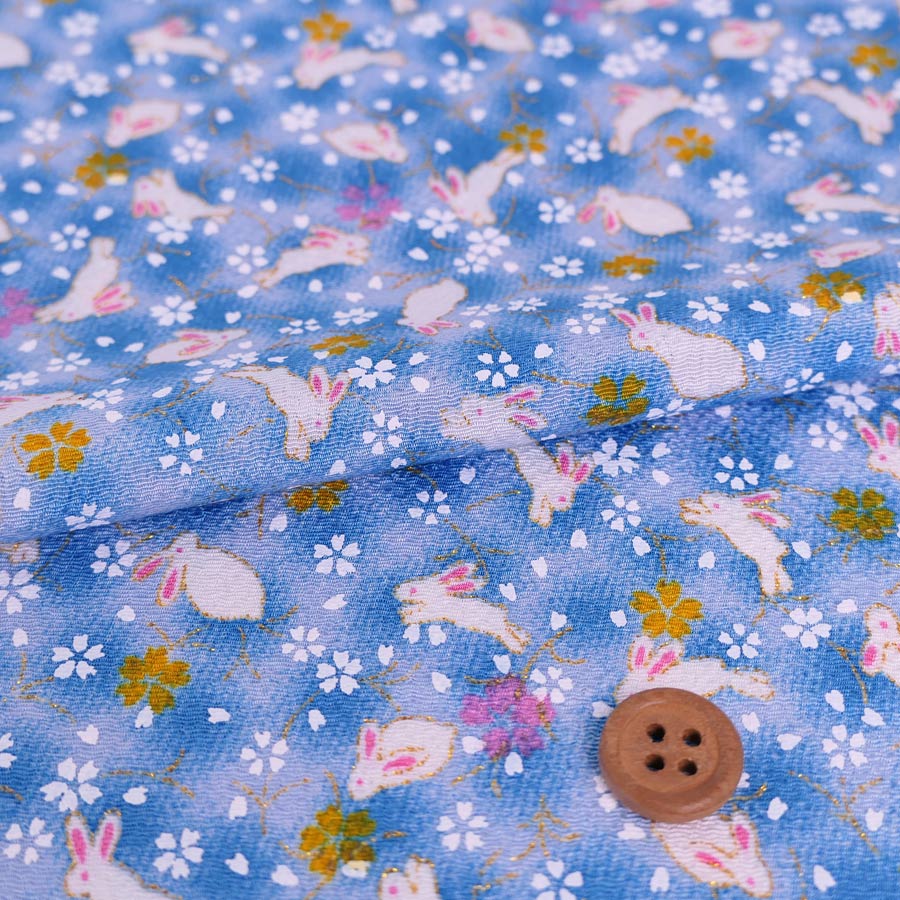 ちりめん生地・うさぎと桜(水色) １ｍ単位