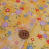 ちりめん生地 ぼかし地に芝と小花(黄色) １ｍ単位