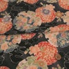 ポリちりめん生地 花雪輪に桜(黒) 10cm単位 切り売り