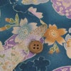 ポリちりめん生地 花雪輪に桜(青) 10cm単位 切り売り