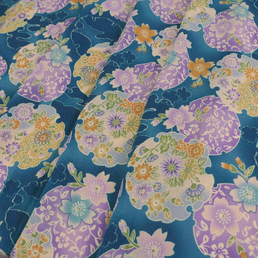 ポリちりめん生地 花雪輪に桜(青) 10cm単位 切り売り