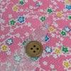 ちりめん生地 小さな花の連なり(ピンク) １ｍ単位